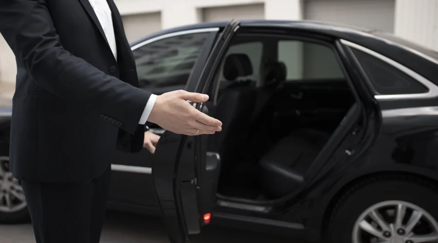 elegant-man-standing-his-car-taxi-services