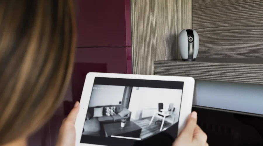 close-up-woman-checking-security-camera